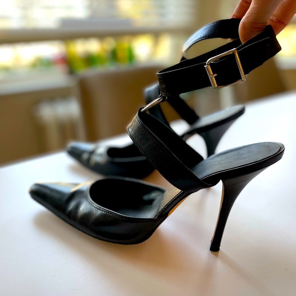Black leather Manolo Blahnik pumps w/ cool ankle straps